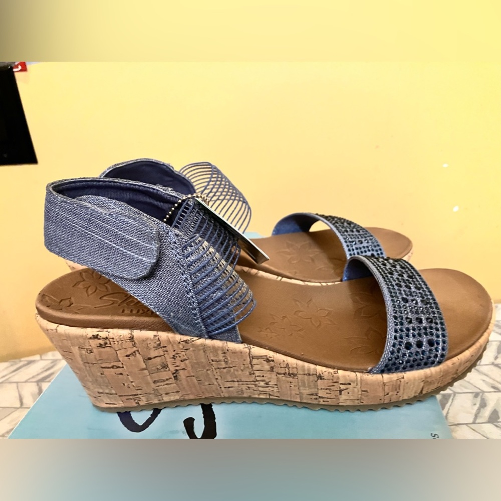 Brand new tags on size women’s 9 sketcher vegan sandals blue color